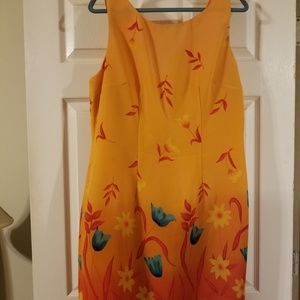 Pretty orange summer dress with teal flowers